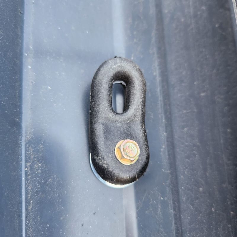 Tie down roof bracket